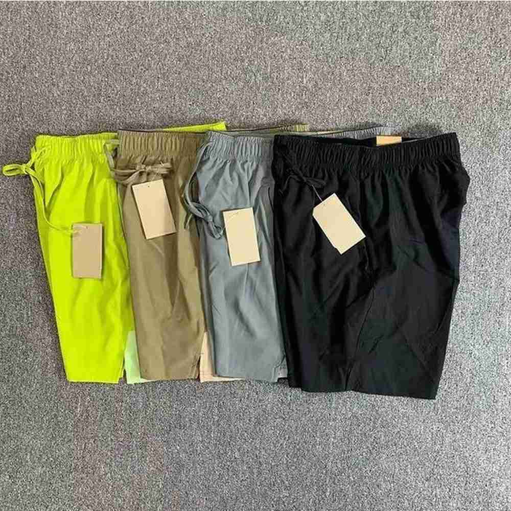 Designer mens beach shorts summer thin shorts quick-dry pants streetwear men fashion mesh fitness knee length sports swim shorts solid color
