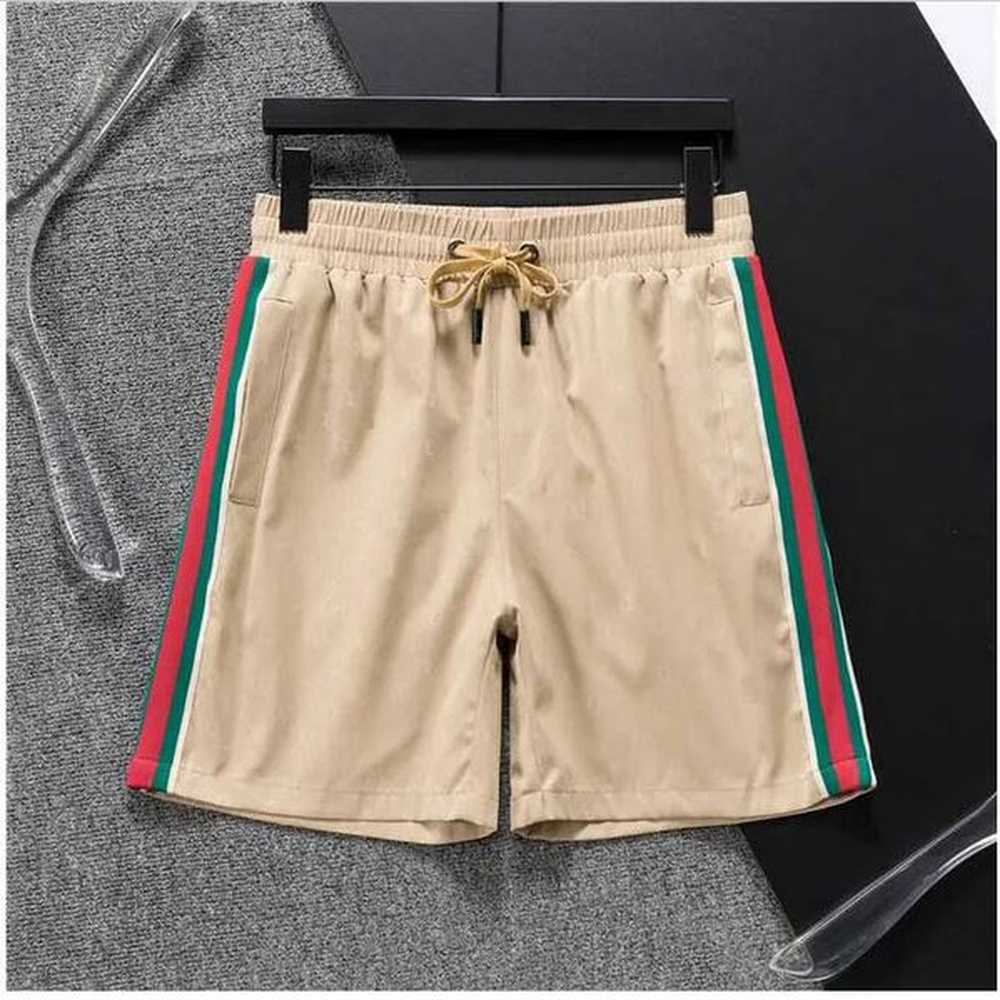 Desingers Men Summer Slim Shorts Gym Fitness Bodybuilding Running Male Short Pant Knee Length Breathable Mesh Sportswear designers beach pan