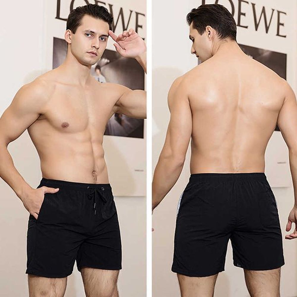 Men's Shorts Beach pants mens 2024 spring and summer quick drying loose seaside vacation shorts quarter length pants solid color sports