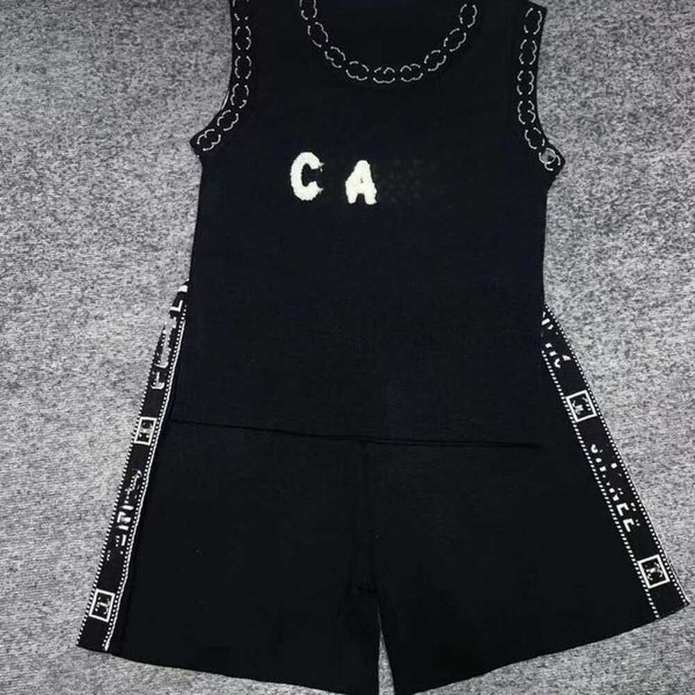 twopiece designer outfit embroidered graphic tee and knit shorts set